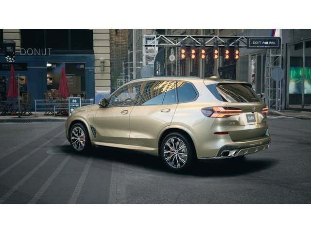 New 2026 Manhattan Green Metallic BMW xDrive50e image 2