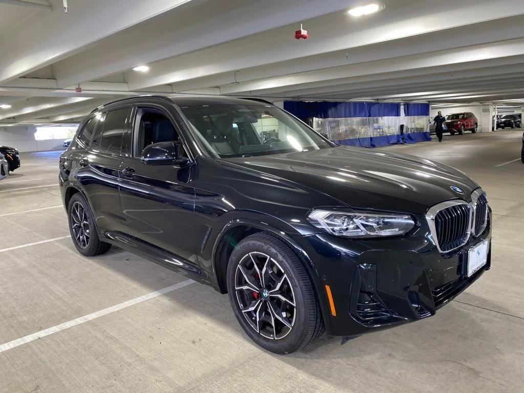 Used 2022 Black Sapphire Metallic BMW M40i image 2