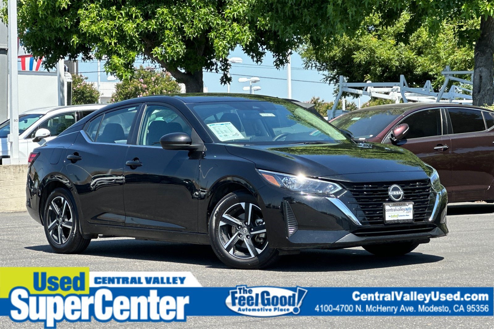 Used 2024 Super Black Nissan SV image 1