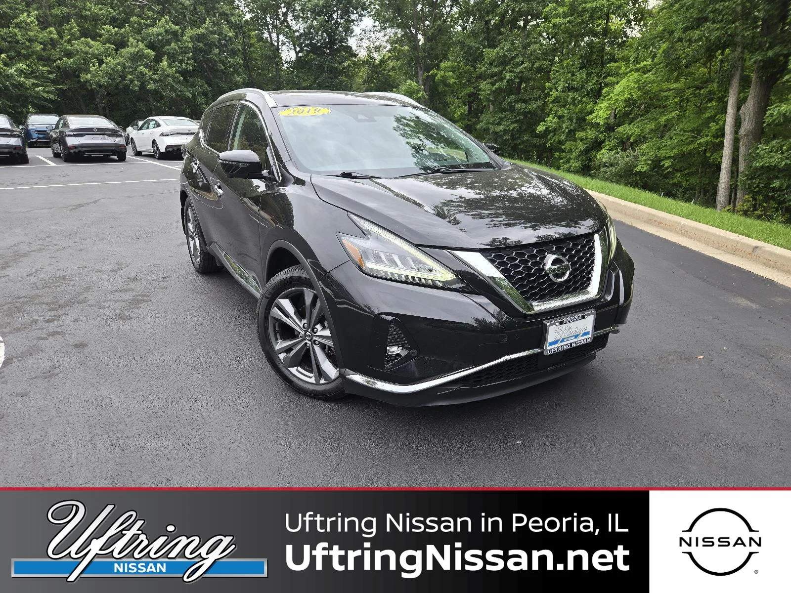 Used 2019 Magnetic Black Pearl Nissan Platinum image 1