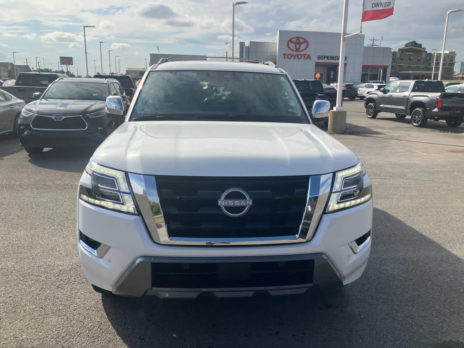 Used 2024 Aspen White Tricoat Nissan Platinum image 2