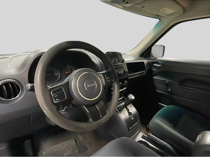 Used 2015 Black Clearcoat Jeep Sport image 9