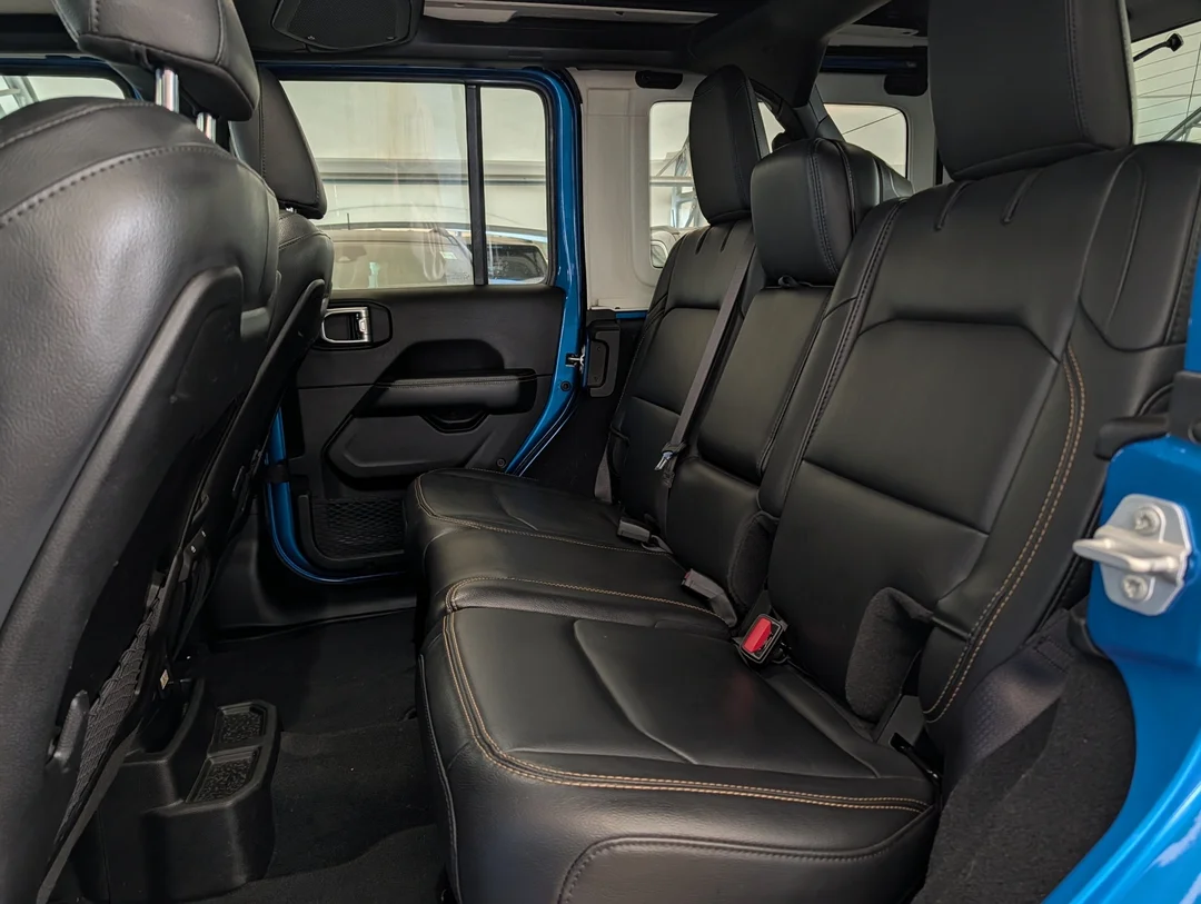 Used 2024 Blue Jeep Sahara - - 4x4 - Leather Seats - Power Soft Top - Remote Start & More! image 28