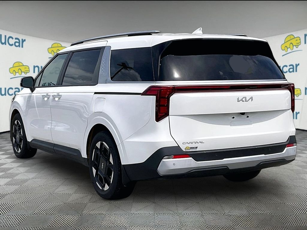 Used 2025 Snow White Pearl Kia EX image 4