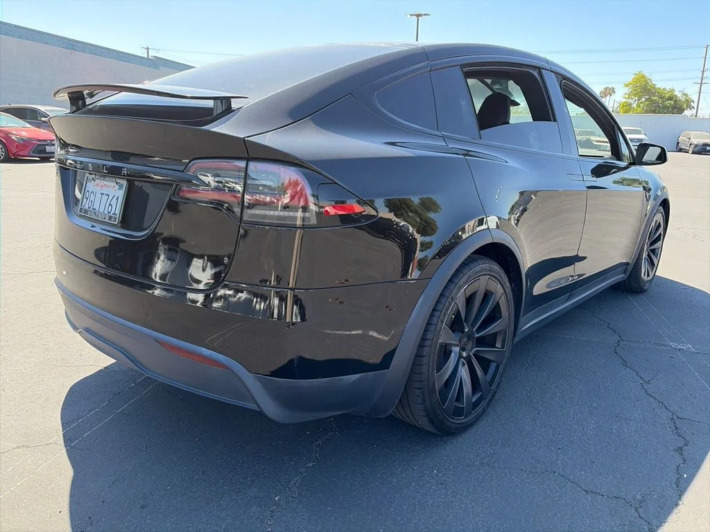 Used 2023 Solid Black Tesla Plaid image 6