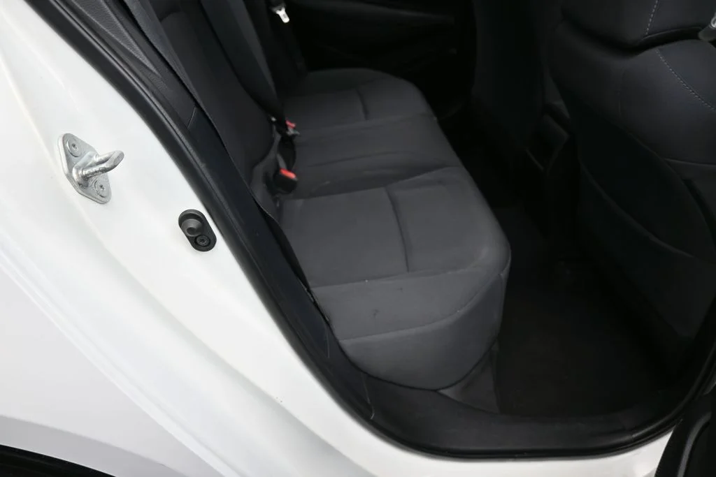 Used 2021 Super White Toyota LE image 30