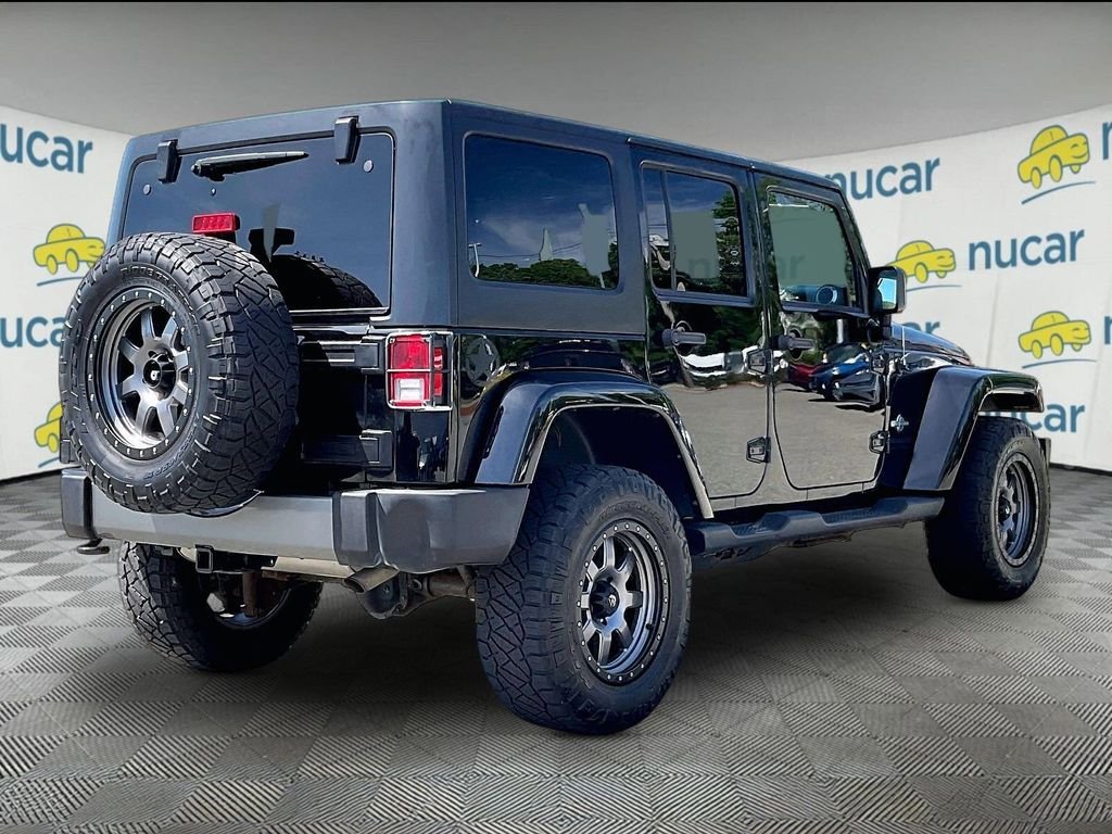 Used 2015 Black Jeep Unlimited Freedom Edition image 6