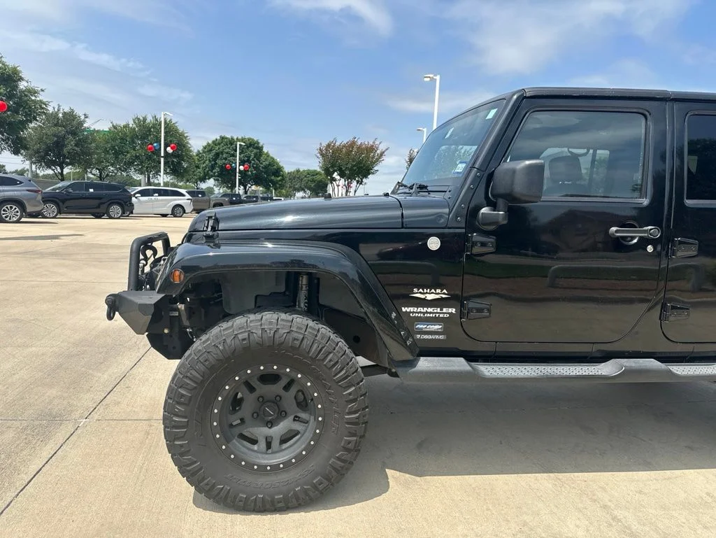Used 2010 Jeep Wrangler Unlimited Sahara with VIN 1J4BA5H12AL162495 for sale in Irving, TX