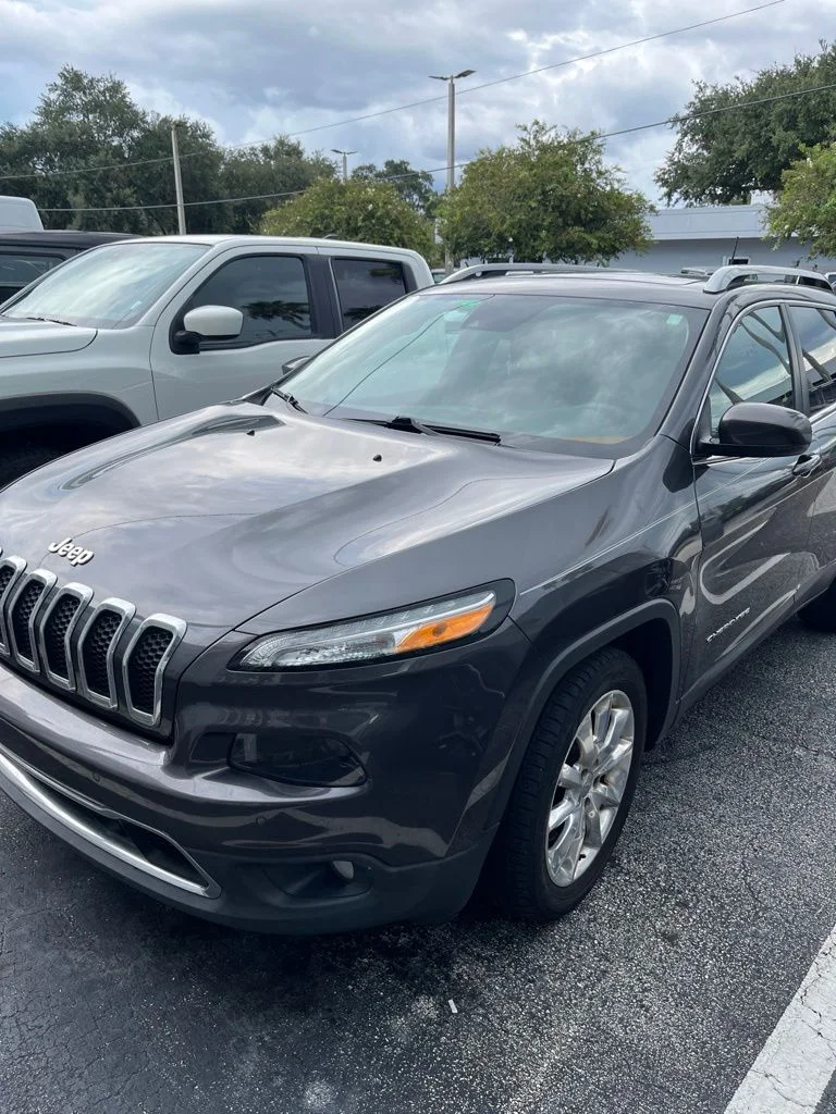 Used 2016 Gray Jeep Limited image 1