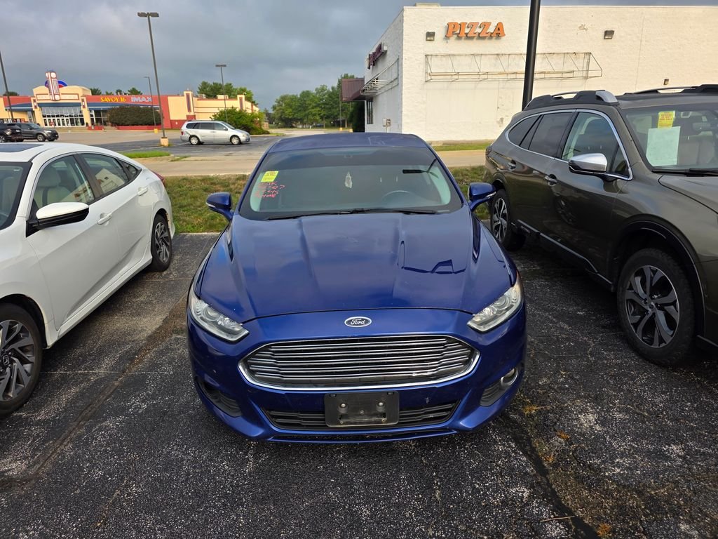 Used 2016 Deep Impact Blue Ford SE image 1