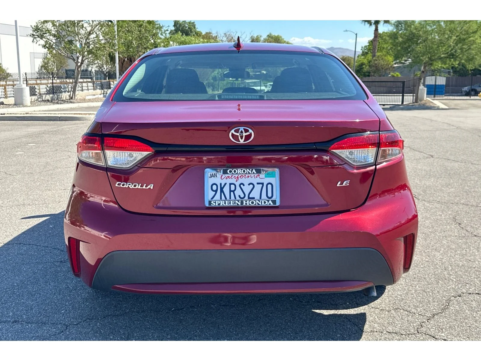 Used 2022 Ruby Flare Pearl Toyota LE image 2