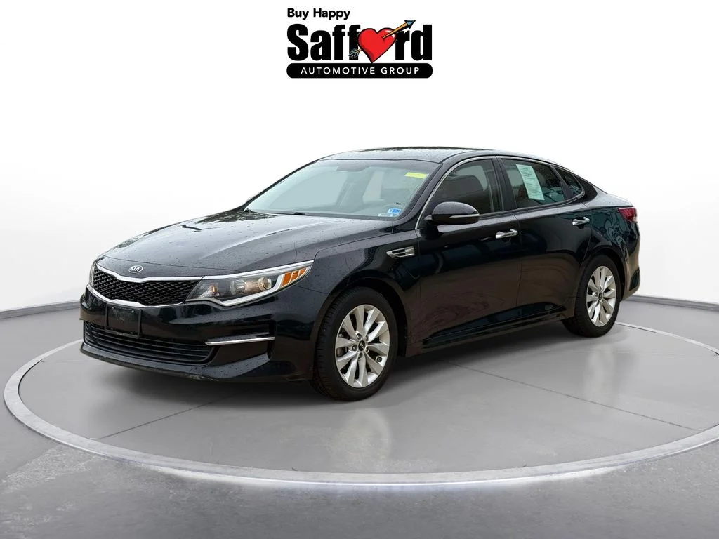 Used 2016 Ebony Black Kia LX image 1