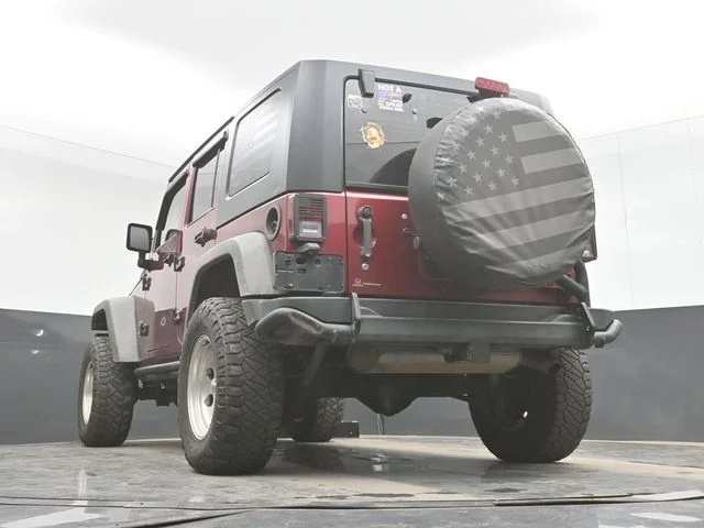 Used 2012 Red Jeep Unlimited Sport image 29