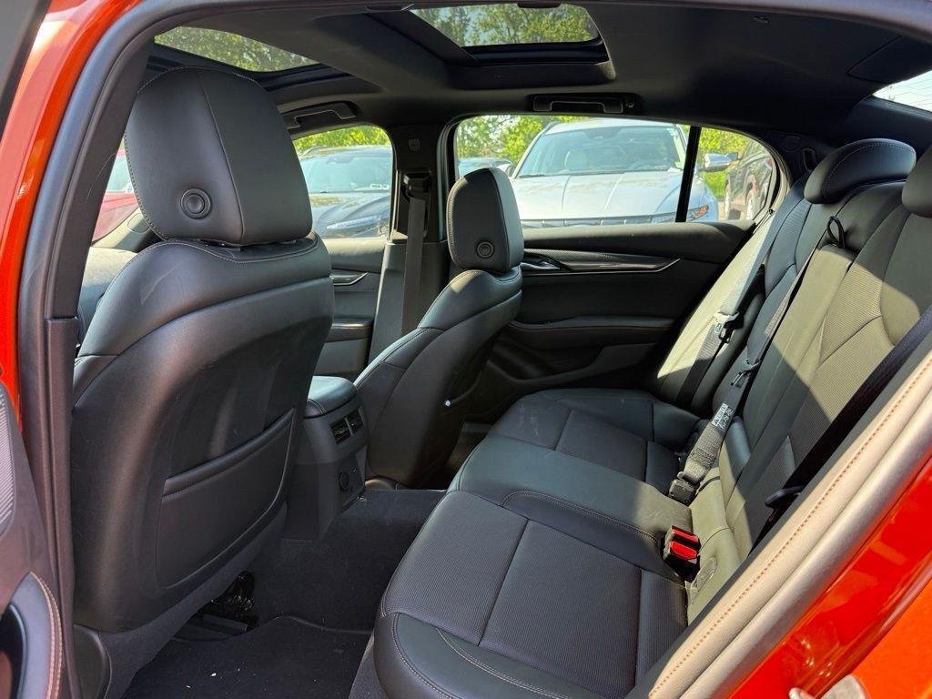 Used 2023 Blaze Orange Metallic Cadillac Sport image 7