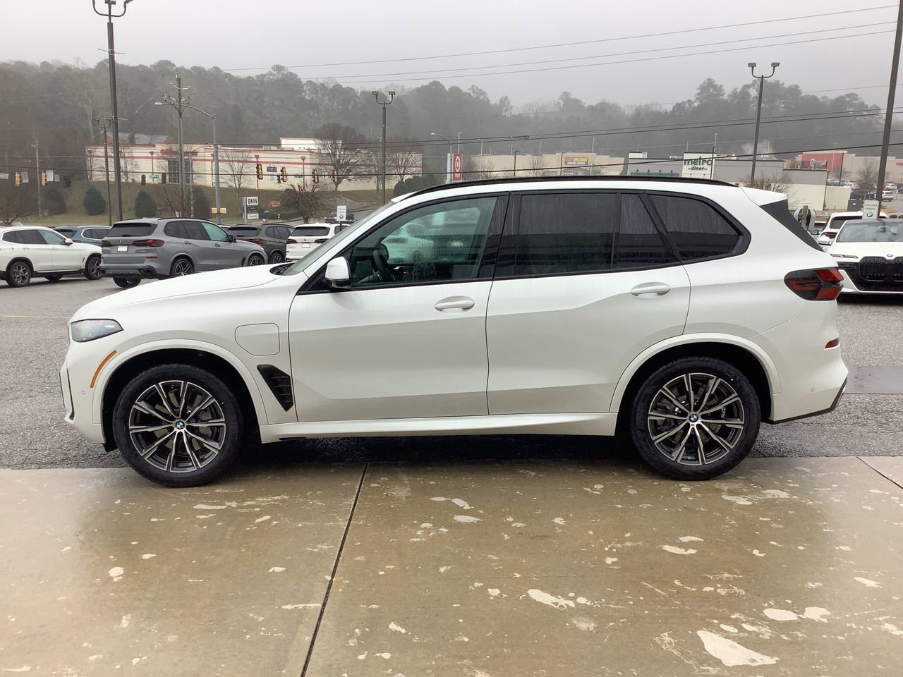 Used 2026 Mineral White Metallic BMW xDrive50e image 5