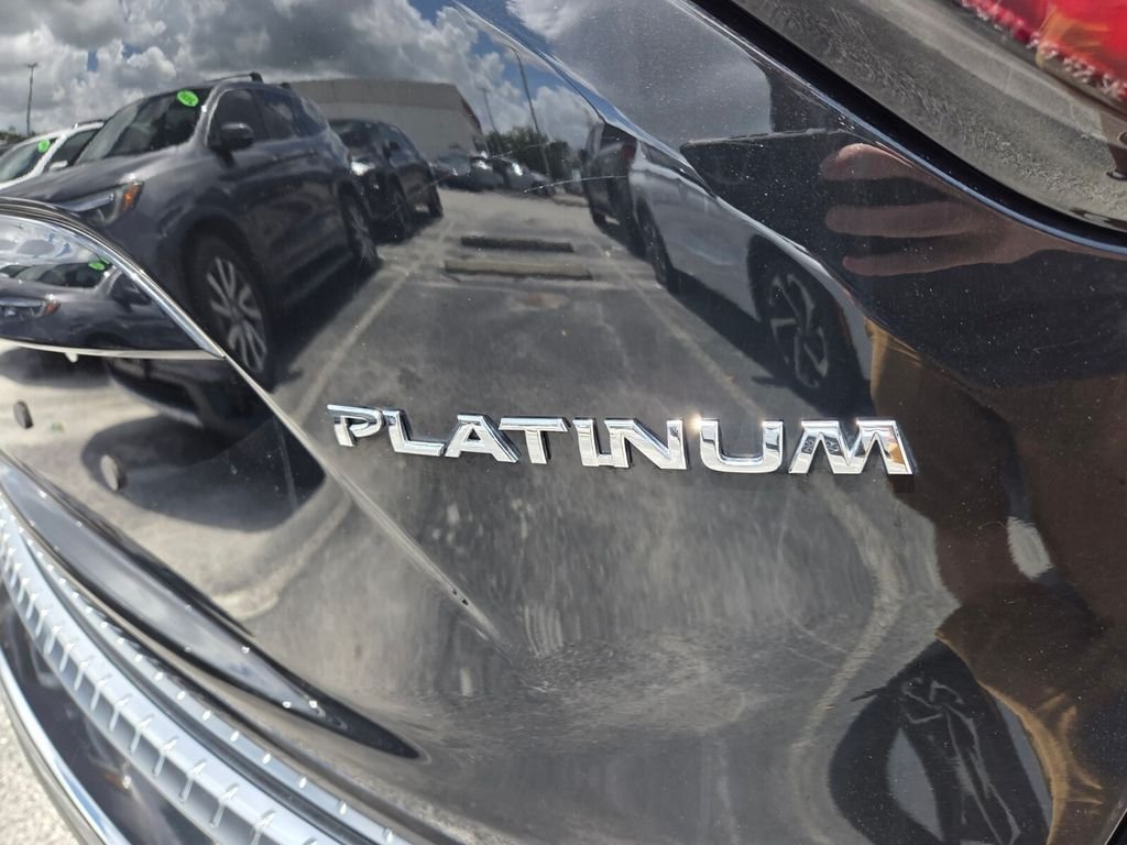 Used 2022 Black Nissan Platinum image 14