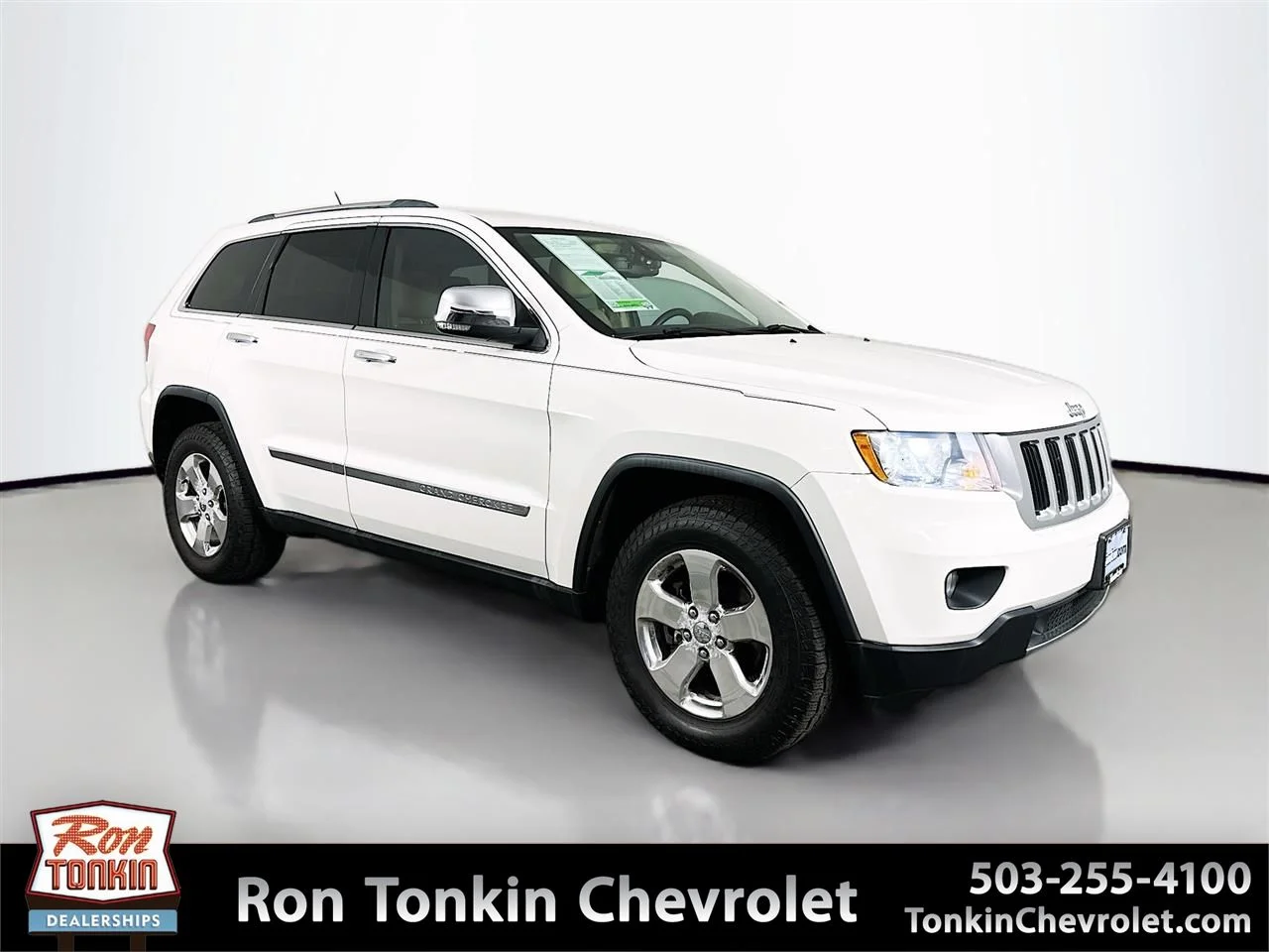 Used 2011 Stone White Clearcoat Jeep Limited image 1
