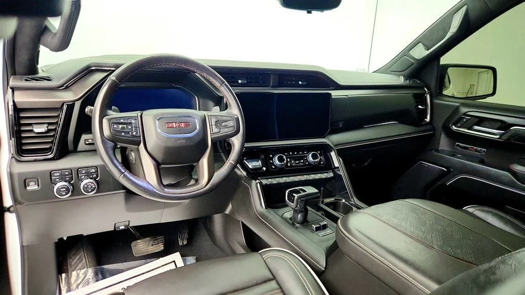 Used 2024 Summit White GMC 4WD Crew Cab 147"" AT4X image 12