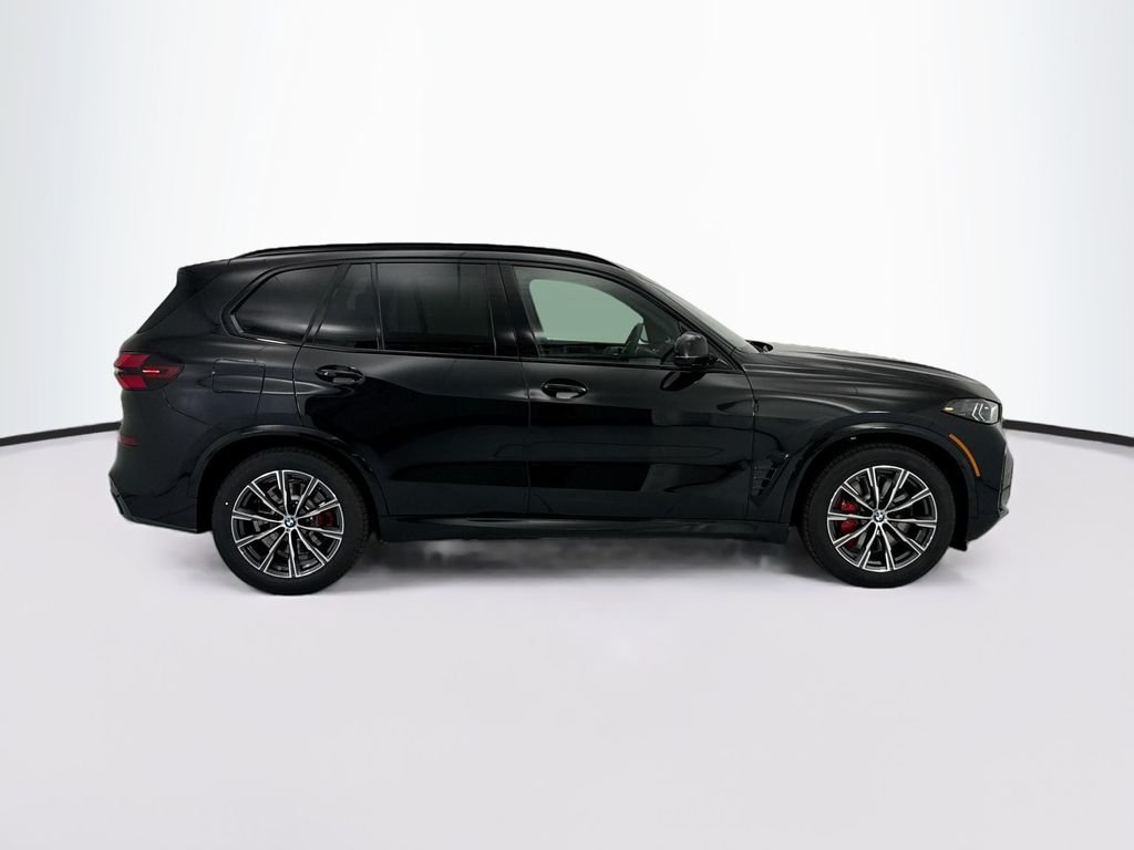 New 2026 Black Sapphire Metallic BMW xDrive50e image 4
