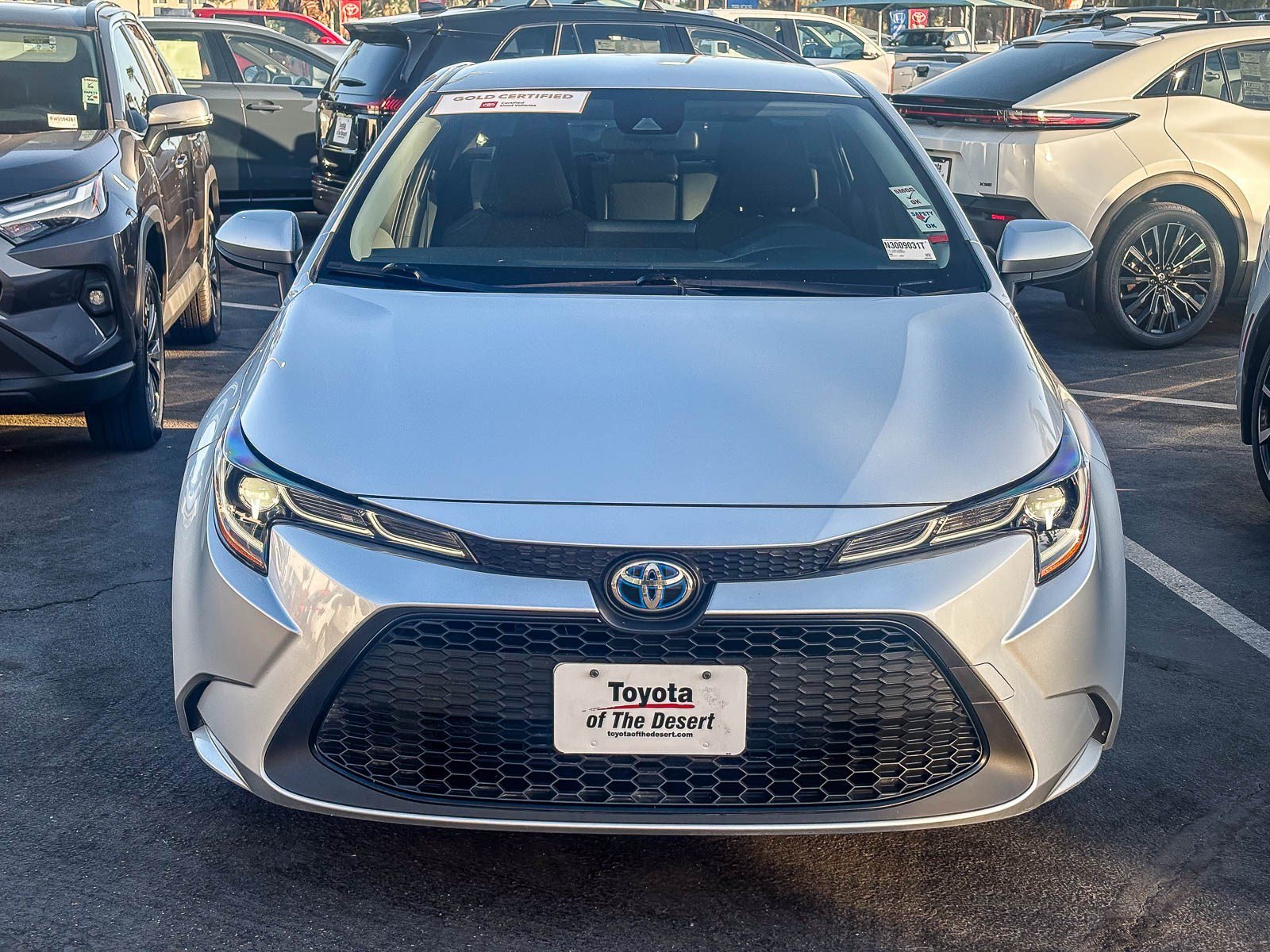 Used 2022 White Toyota Hybrid LE image 2