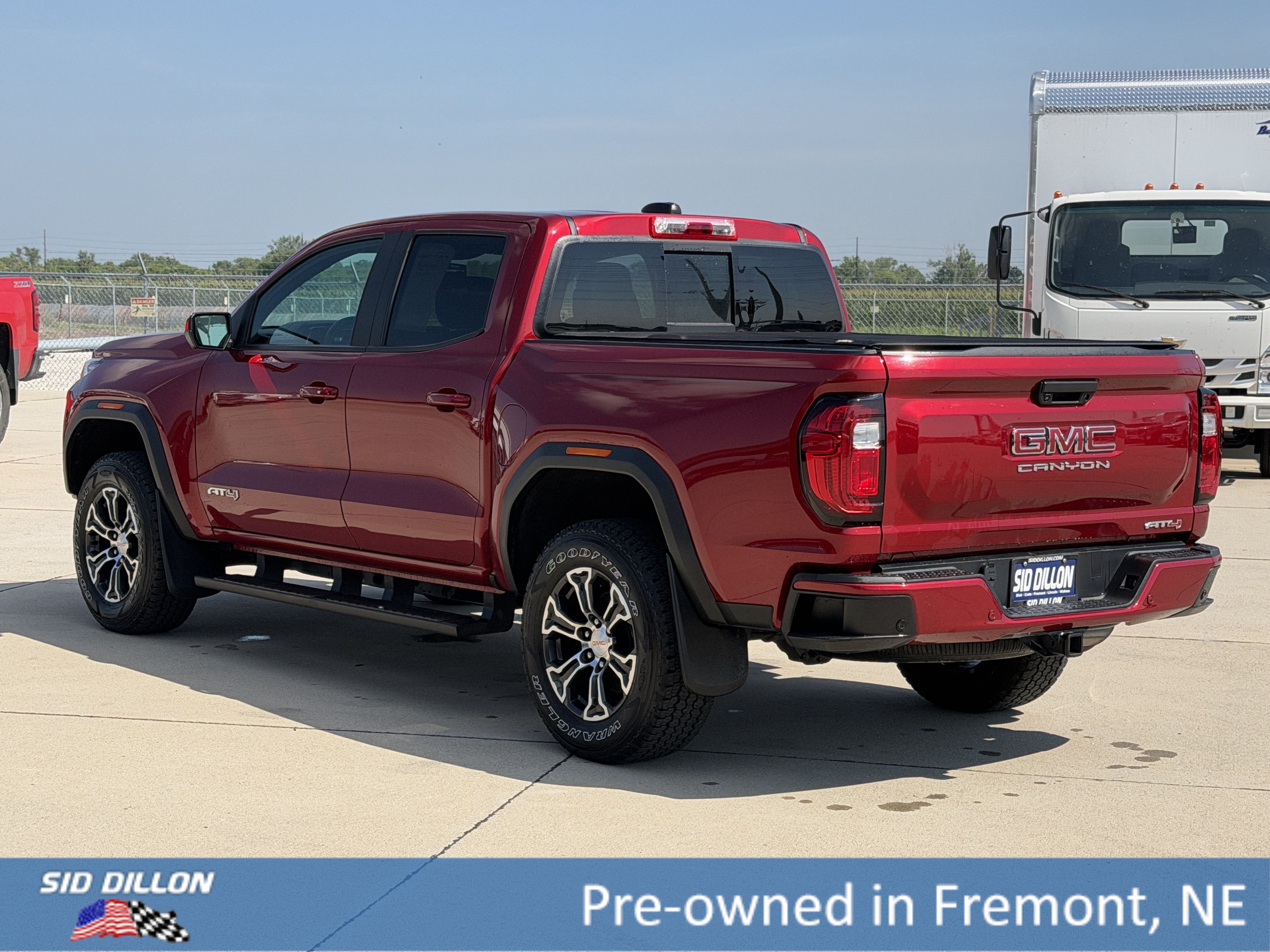 Used 2024 Volcanic Red Tintcoat GMC 4WD AT4 image 7