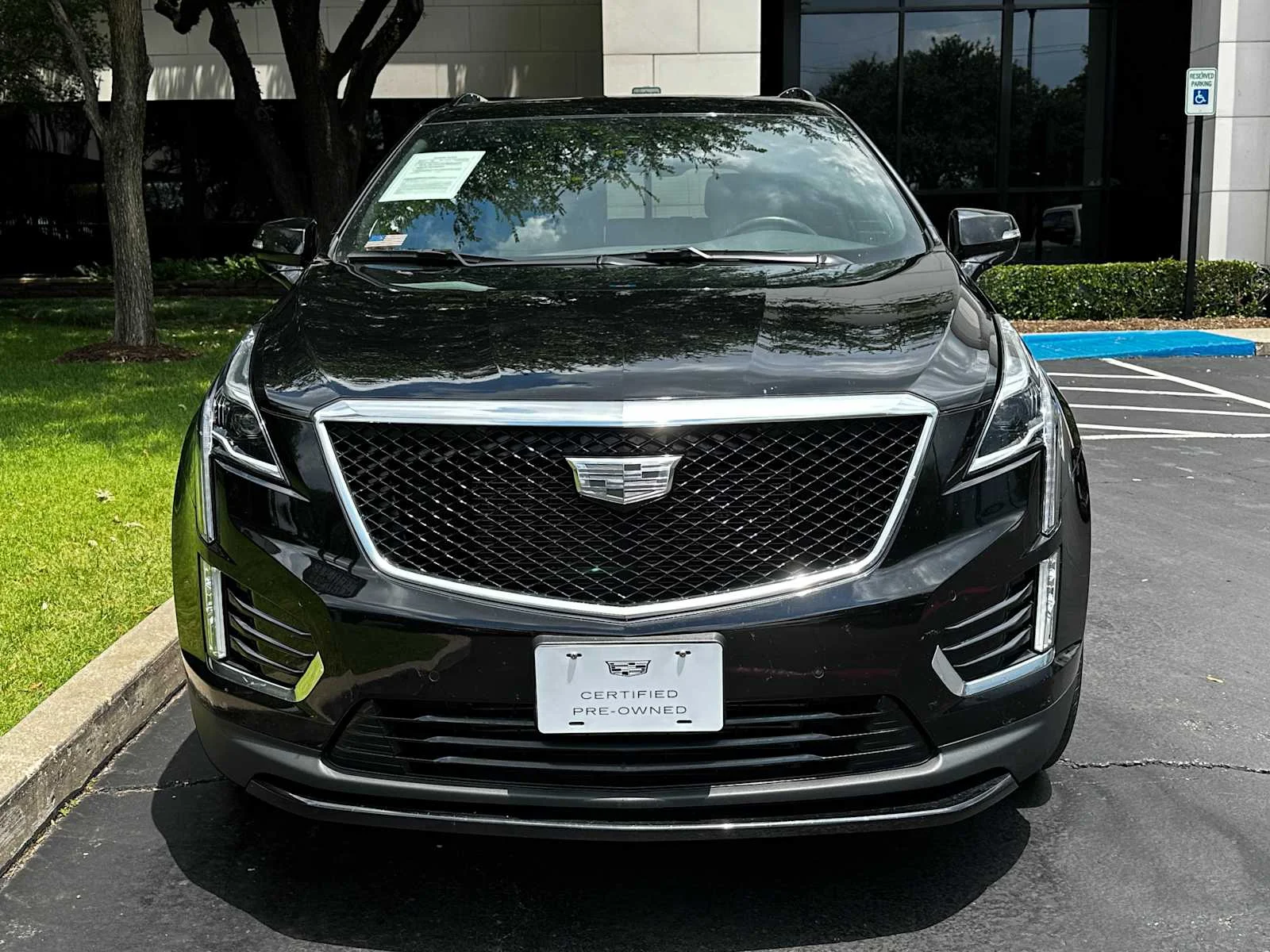 Certified Used 2024 Stellar Black Metallic Cadillac Sport image 2