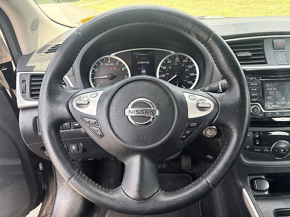 Used 2018 Super Black Nissan SV image 17