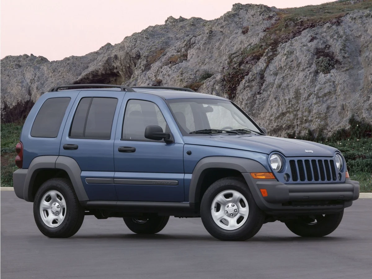 Used 2006 Blue Jeep Sport image 1