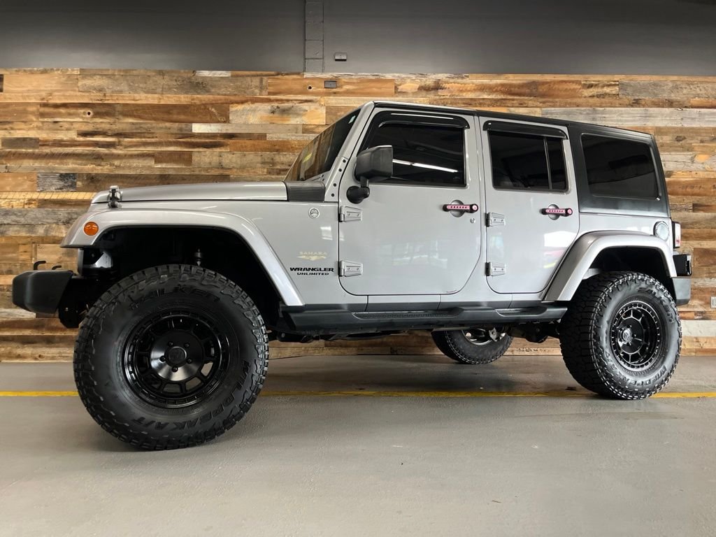 Used 2014 Billet Metallic Clearcoat Jeep Unlimited Sahara image 47
