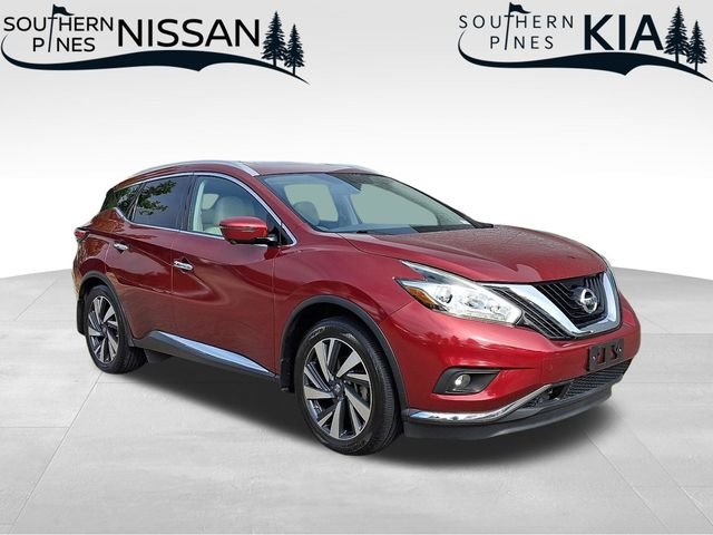 Used 2016 Red Nissan Platinum image 1