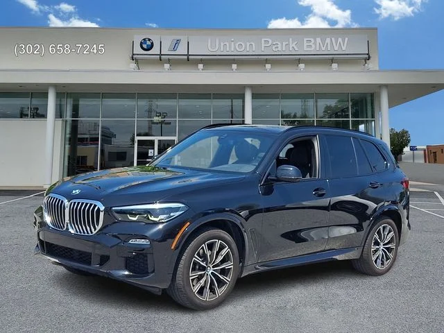 Used 2021 Black Sapphire Metallic BMW xDrive40i image 1