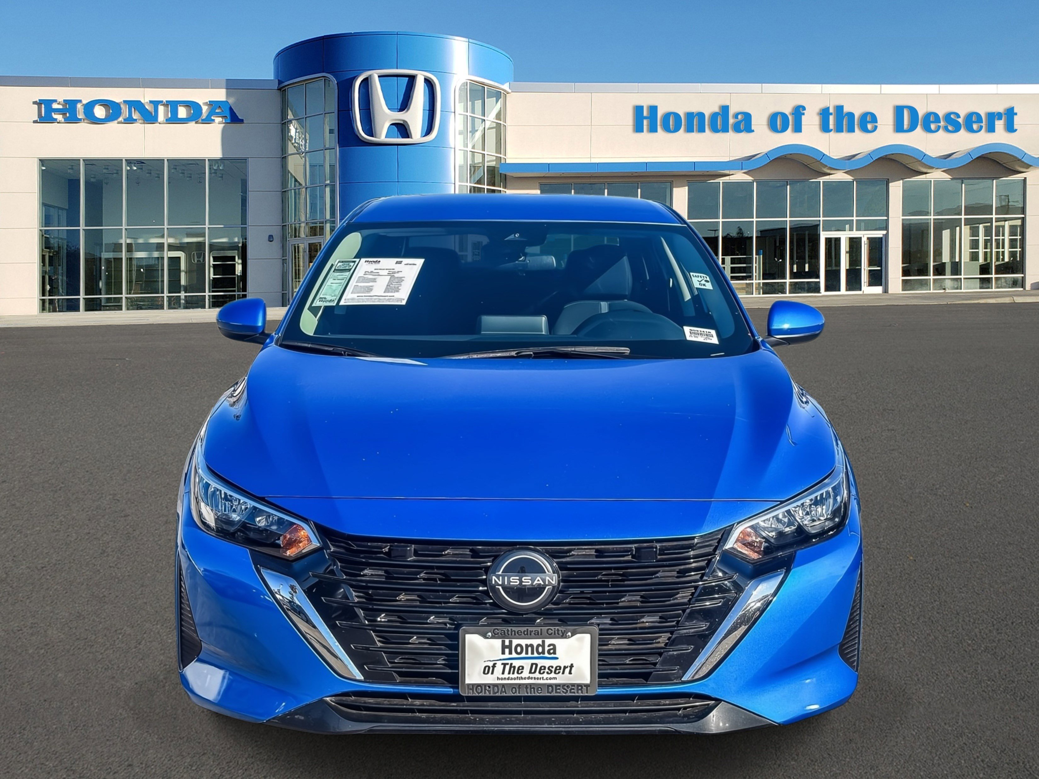 Used 2024 Electric Blue Metallic Nissan SV image 2