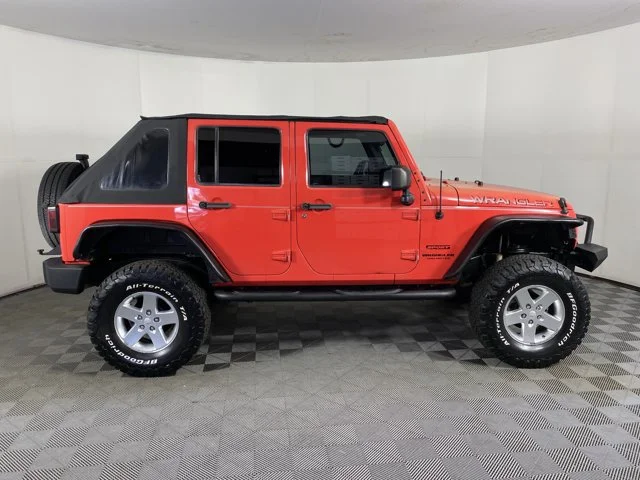 Used 2013 Red Jeep Unlimited Sport image 7