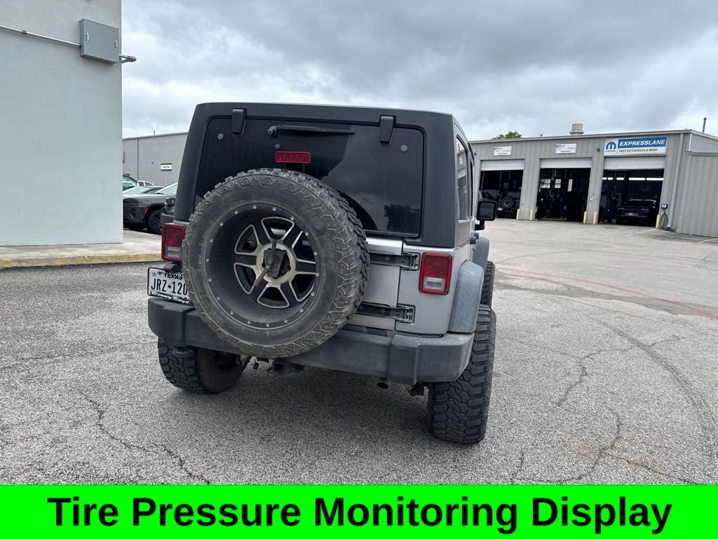 Used 2017 Silver Jeep Unlimited Sport image 13