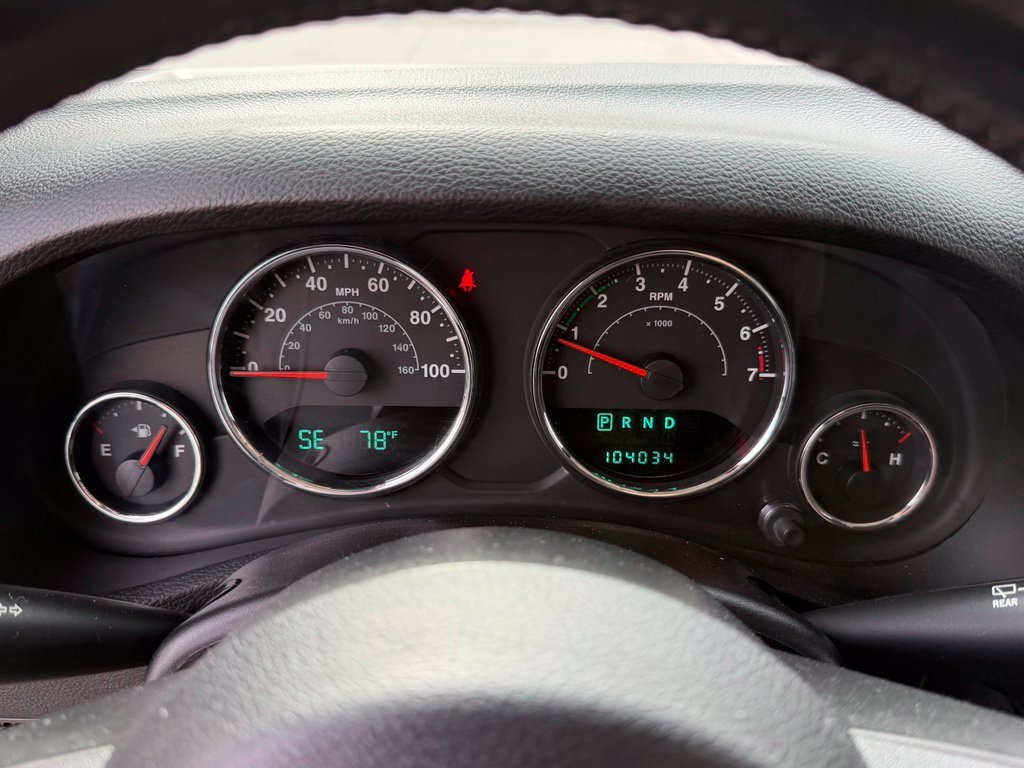Used 2012 Silver Jeep Unlimited Sport S image 23