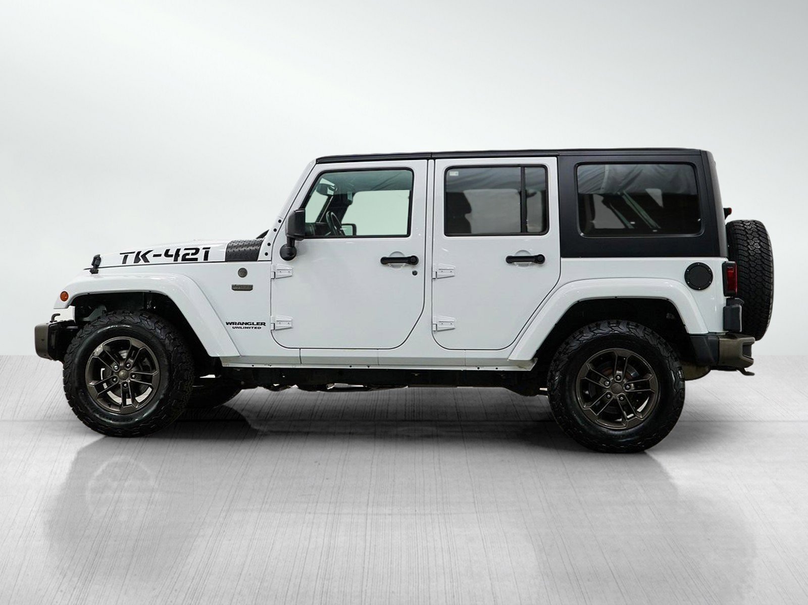 Used 2016 Jeep Wrangler Unlimited 75th Anniversary Edition with VIN 1C4BJWEG6GL265223 for sale in Burnsville, Minnesota