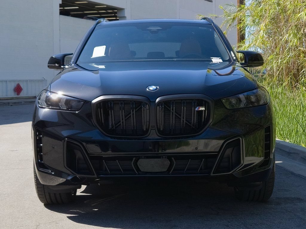 New 2026 Black Sapphire Metallic BMW M60i image 3