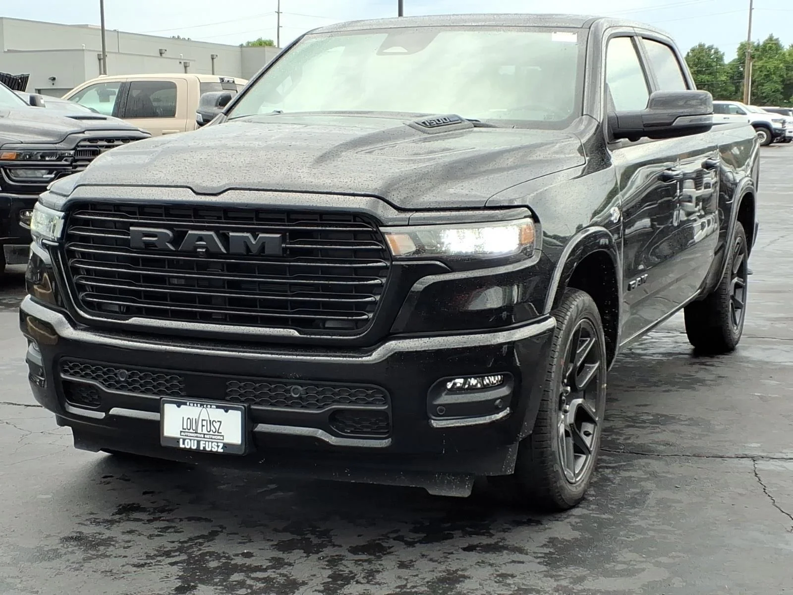 New 2026 Diamond Black Crystal Pearl-Coat Exterior Paint RAM Laramie image 2