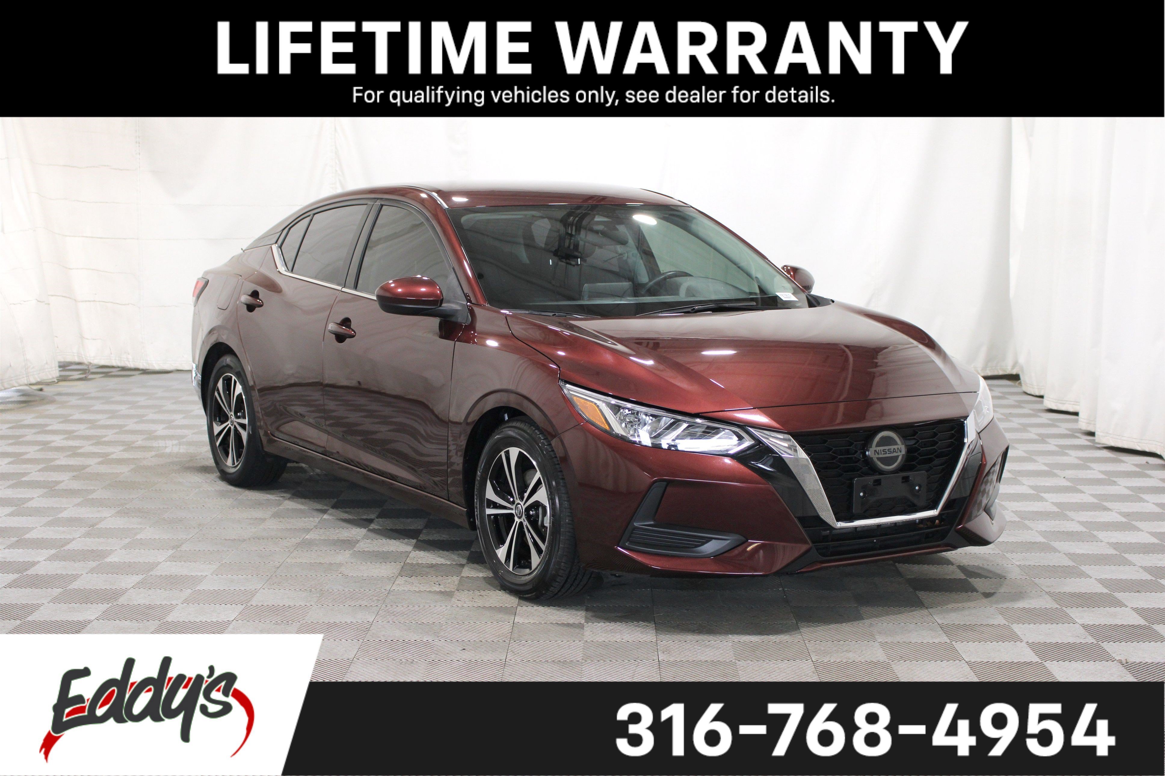 Used 2023 Rosewood Metallic Nissan SV image 1