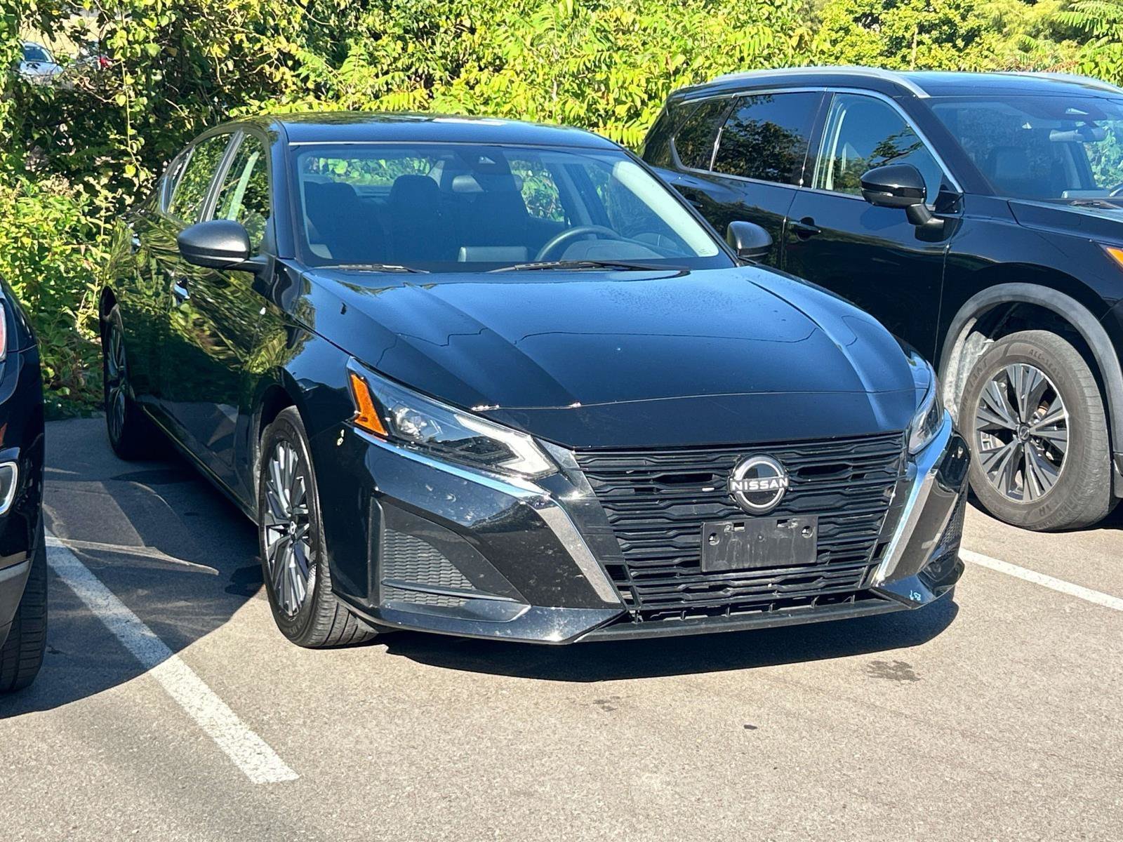 Used 2025 Super Black Nissan SV image 1