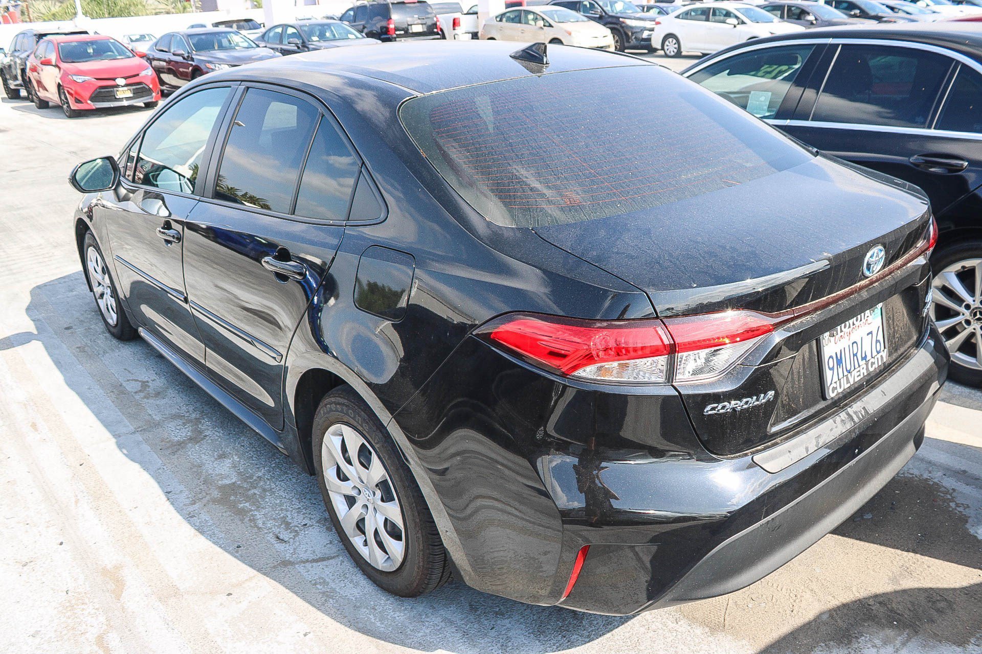 Used 2024 Midnight Black Metallic Toyota Hybrid LE image 11