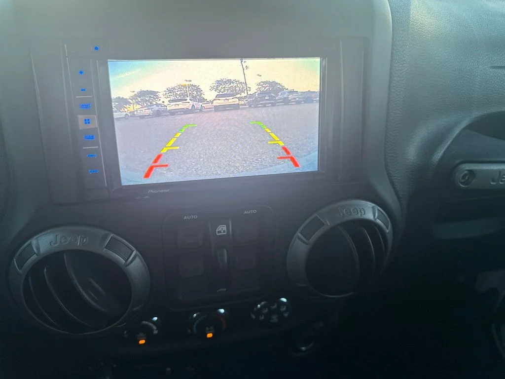 Used 2018 White Jeep Unlimited Sport image 19