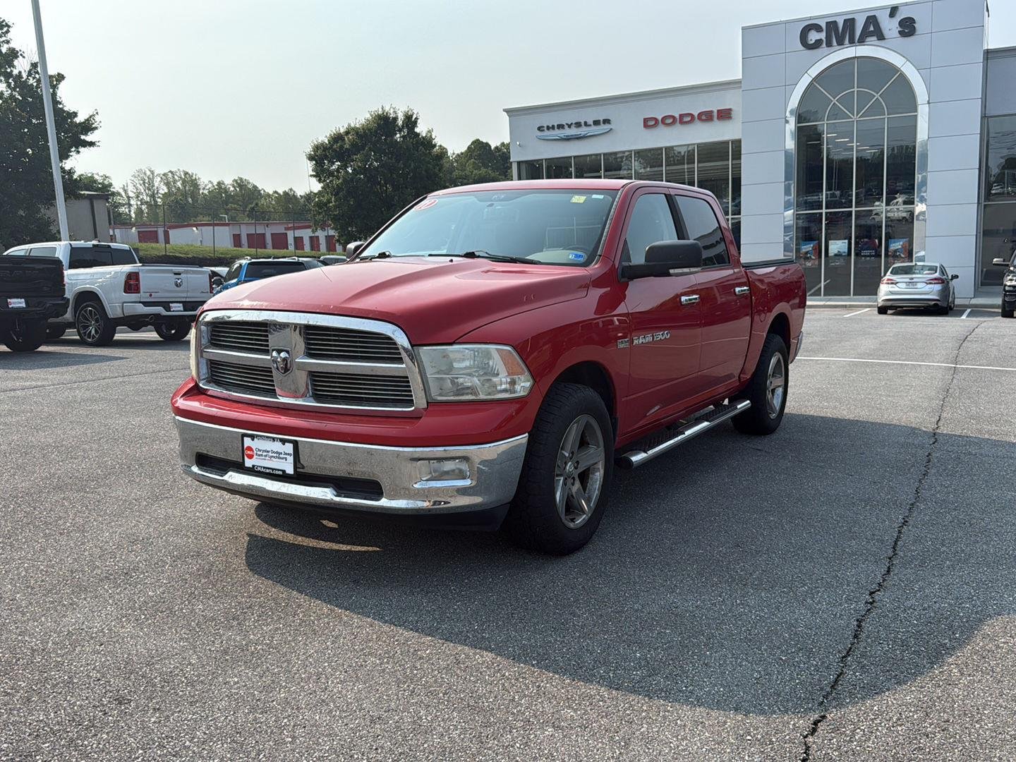 Used 2011 Flame Red Ram Big Horn image 1