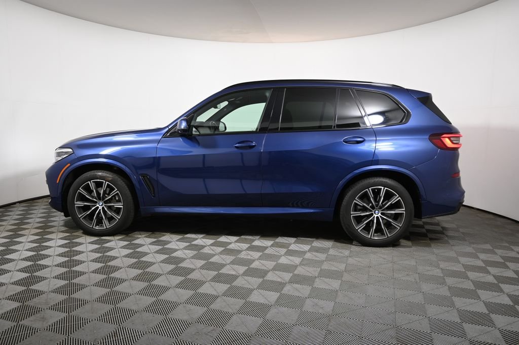 Certified Used 2023 Blue Metallic BMW xDrive40i image 2