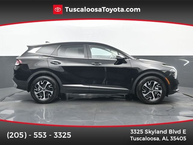Used 2024 Ebony Black Kia EX image 1