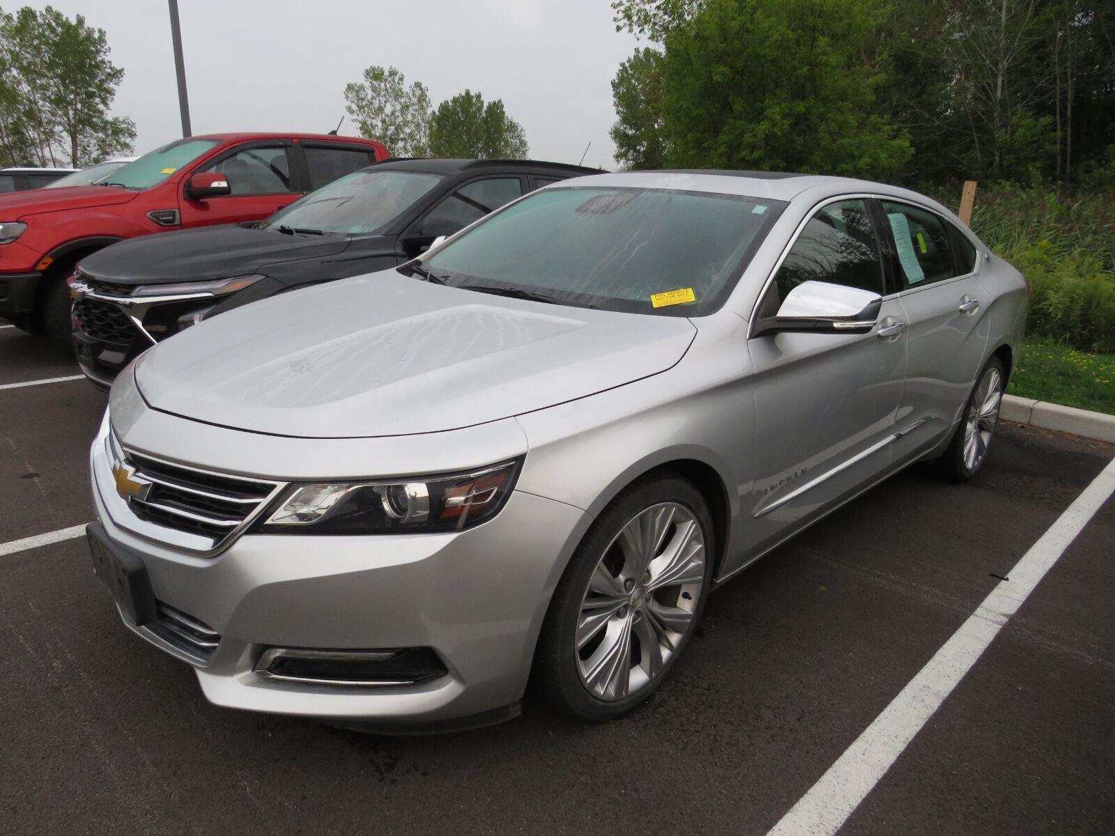 Used 2014 Silver Ice Metallic Chevrolet LTZ image 4