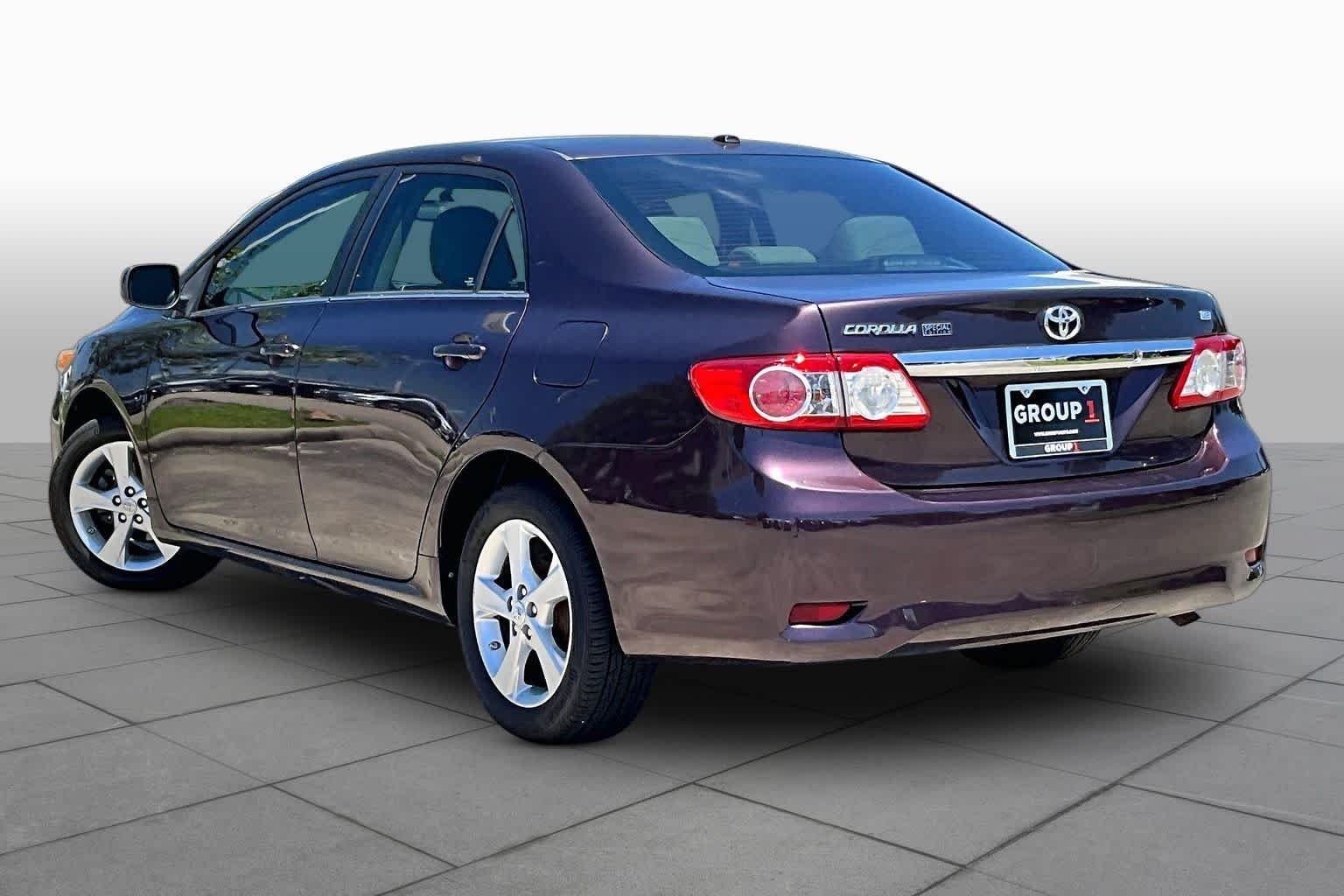 Used 2013 Black Currant Metallic Toyota LE Special Edition image 11