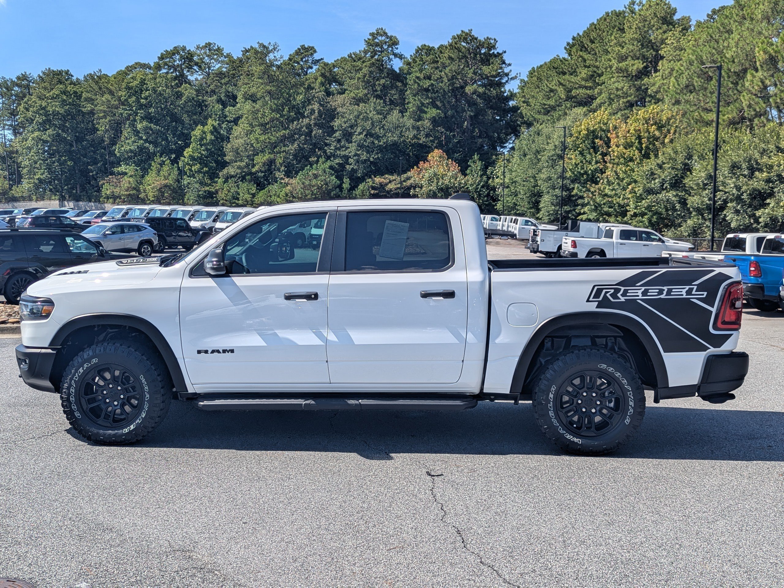 Used 2025 Bright White Clearcoat Ram Rebel image 4