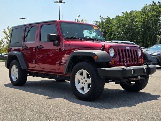 Used 2013 Red Jeep Unlimited Sport image 7
