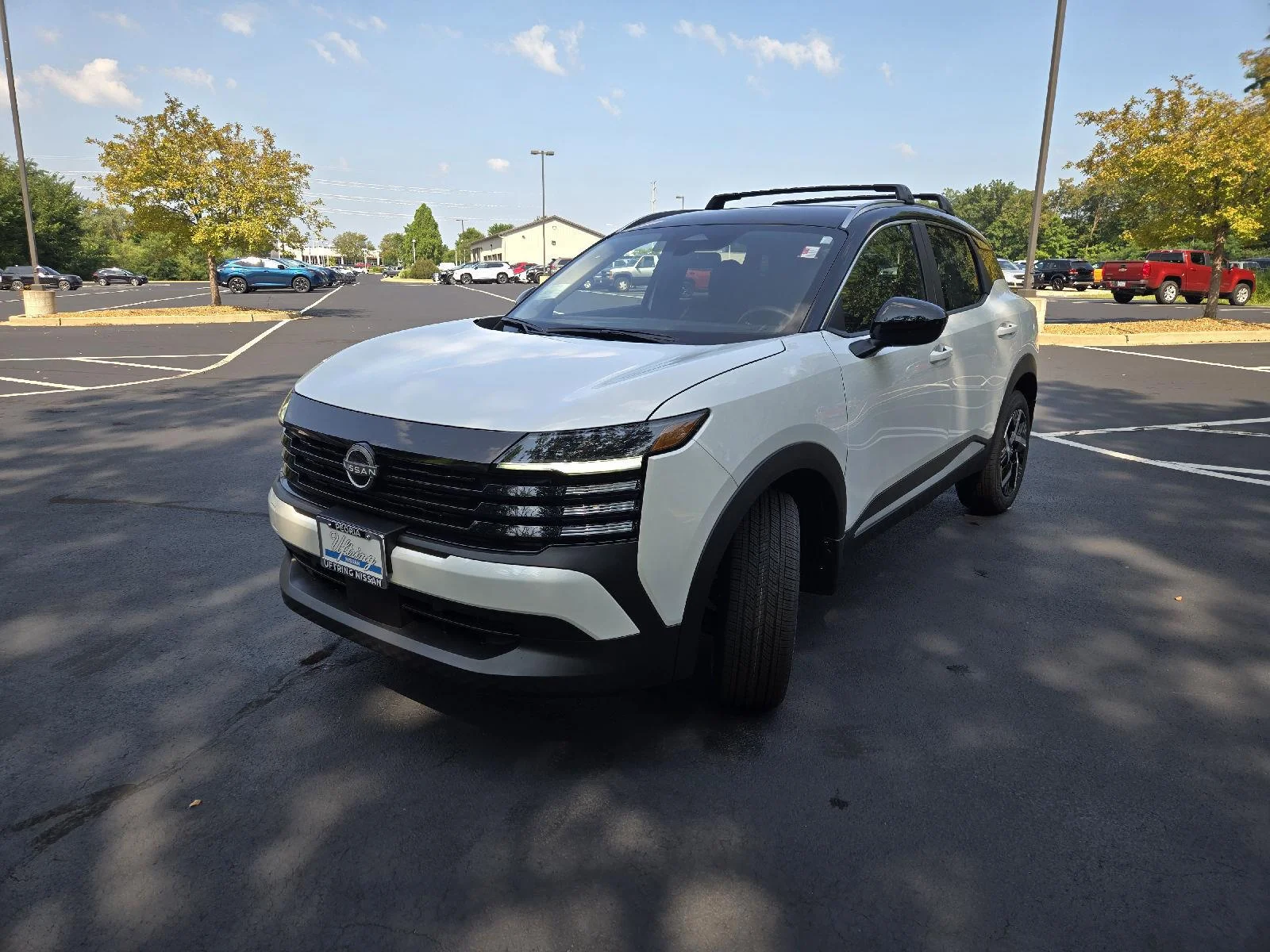 New 2026 Aspen White Tricoat/Super Black Nissan SV image 4